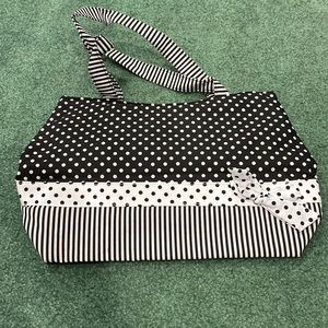 Brand-new black and white bag.